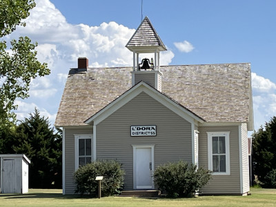 Image of a one room school with bell tower at Santa Fe Trail Center Museum & Research Library