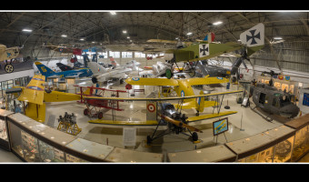 Interior of an airplane hangar filled with planes at the Combat Air Museum.