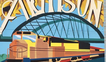 Mural with text "Atchison: beautiful, historic" and featuring sunflowers, an arched bridge, and a train.